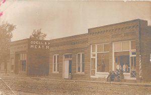 G13/ Paton Iowa RPPC Postcard c1910 Barber Shop Meat Market Dr Wadell