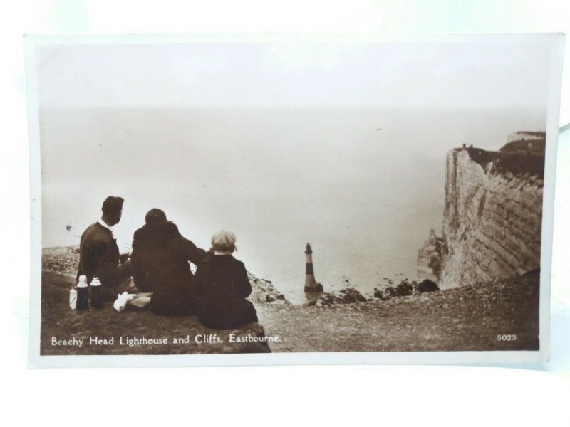 Family Enjoying a Picnic at Beachy Head Lighthouse Eastbourne RP Postcard 1939