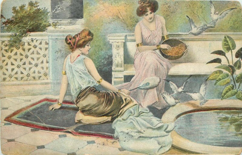 Glamour ladies feeding doves early postcard