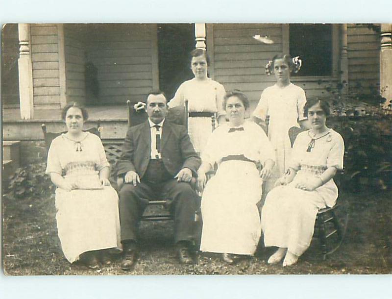Pre-1920's rppc GIRL WITH BOW IN HAIR WITH SIBLINGS & ELDERS r6297