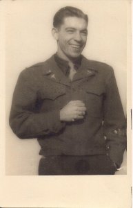 RPPC WWII Handsome US Soldier in Damaged Uniform, GI, France 1945