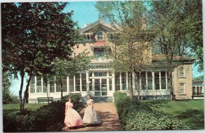 postcard Villa Louis, Prairie du Chien, Wisconsin - girls in frontier dress