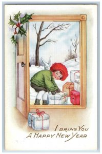 New Year Postcard Little Boy With Gifts Holly Berries Winter Scene c1920's