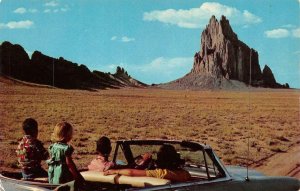New Mexico NM   CHILDREN In CONVERTBLE CAR At FAMOUS SHIP ROCK    Postcard
