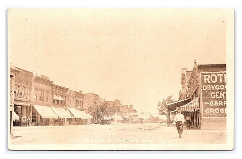 Postcard Main Street West Side Russel (Russell) Kans. Kansas RPPC c1911 Postmark