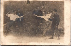 RPPC, Two Young Men Fencing, Belgium c1917 Postcard T57