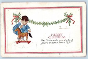 Christmas Postcard Little Girl Playing Horse Toy Mistletoe Embossed Temple PA