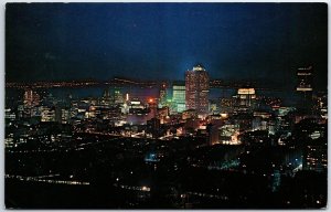 VINTAGE POSTCARD MONTREAL AT NIGHT AS SEEN FROM MOUNT ROYAL POSTED 1965