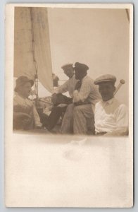 RPPC Men Aboard Sailboat Real Photo Postcard T24
