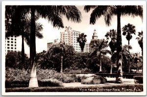 View From Bayfront Park Miami Florida Trees & Building RPPC Real Photo Postcard