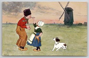 Dutch Children With Puppy And Windmill  Girl With Doll Postcard L22