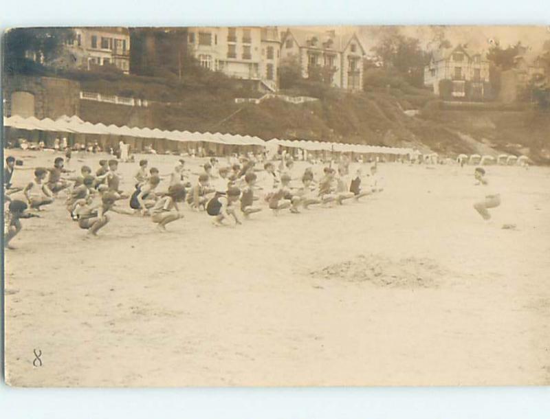 c1910 rppc MANY KIDS EXERCISING ON THE BEACH SHORELINE HM0900