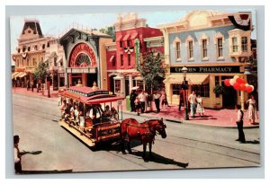 Vintage 1970 Postcard Disneyland Horse Drawn Streetcar Upjohn Pharmacy
