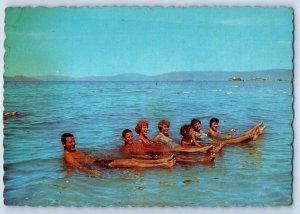 1960 Great Salt Lake Utah UT Postcard Floating Saltiest Body Water World Bathing
