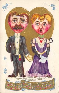 Men and woman singing with heart shaped heads Oddities 1912 