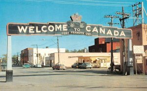 FORT FRANCES, Ontario Canada CANADA WELCOME SIGN & Street Scene c1950's Postcard