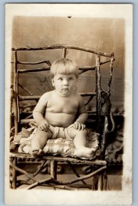 c1910's Cute Fat Little Boy Sitting On Chair Studio RPPC Photo Antique Postcard