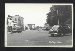 RPPC HASTINGS MICHIGAN DOWNTOWN STREET SCENE OLD CARS REAL PHOTO POSTCARD