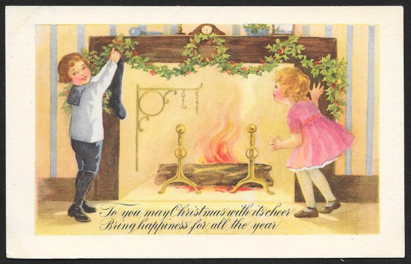To You May Christmas with its Cheer... Boy Girl Holly Fireplace Unused c1910s