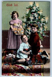 Christmas Postcard Children Decorating Christmas Tree c1910's Antique Posted