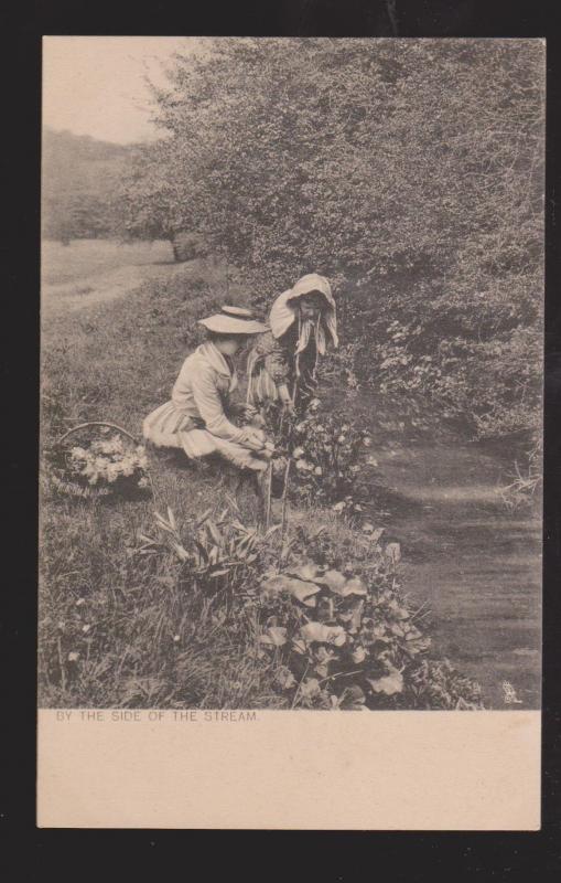 2 Young Ladies Picking Flowers By A Stream - Unused