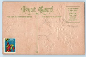 Christmas Postcard Greeting Ringing Bells Holly Berries Embossed c1910's Antique