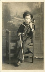 Postcard RPPC C-1910 Illinois Chicago Boy Violin Musician Interior IL24-3094