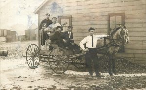 Postcard RPPC Kansas Croweburg Men wagon Guitar 23-2396