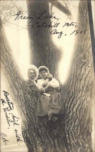 Green Lake Catskills NY Couple Poses in Tree 1905 Real Photo Postcard FUN IMAGE
