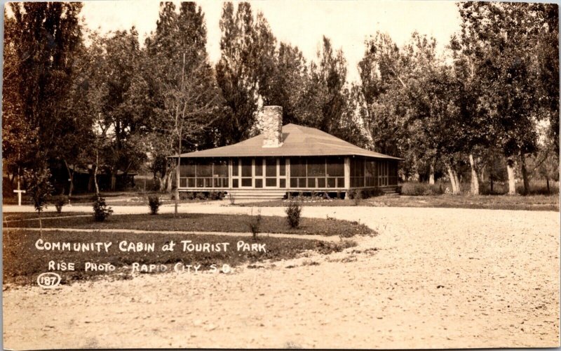 Real Photo Postcard Community Cabin at Tourist Park in Rapid City, South Dakota