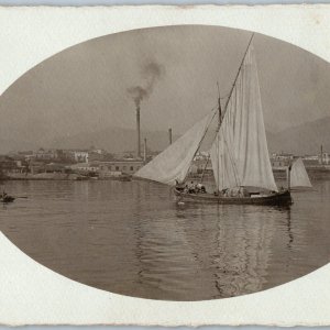 c1900s Foreign Sailboat Oval RPPC Factory Smokestack City Row Boat Asia A187