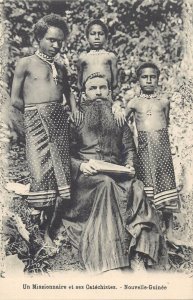 A Missionary and his native Catechists New Guinea Oceania mission old postcard 