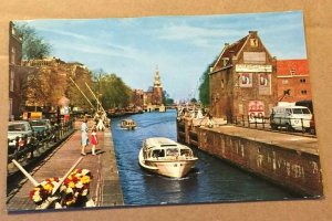 USED POSTCARD - WHERE MONTELBAANSTOWER, AMSTERDAM CANAL - SMALL CREASES