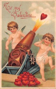 VALENTINE HOLIDAY ANGLES CUPIDS HEARTS GUN CANNON EMBOSSED POSTCARD (c. 1910)