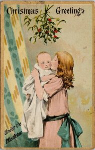 Christmas Greetings Under Mistletoe Woman Kissing Baby Child Xmas Postcard H7