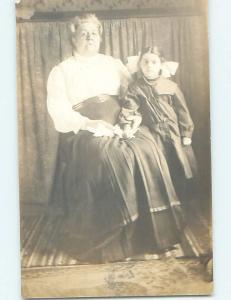 Pre-1918 rppc CUTE GIRL WITH BOW IN HER HAIR BESIDE GRANDMA HM0239