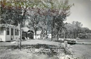 1950s Milford Iowa Vestergaard Cottages Lake Okoboji RPPC Postcard 25-8260