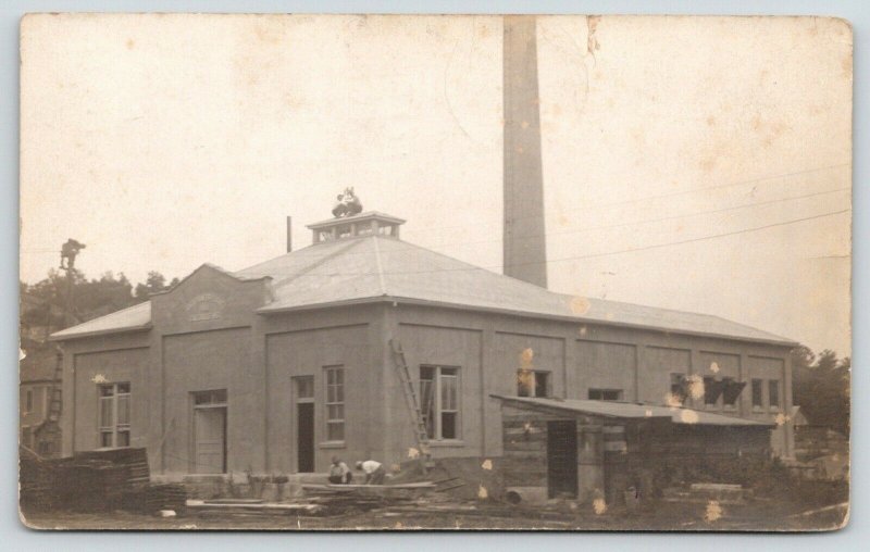 Cassville Wisconsin~City Power Plant under Construction~Men on Roof~1914 RPPC 