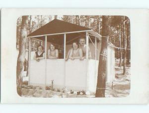 rppc 1932 PEOPLE STANDING IN COVERED AREA IN THE WOODS AC8142