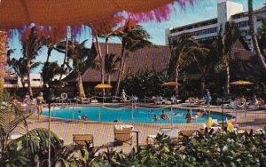 Hawaii Honolulu Swimmiers And Sunbathers Enjoy Garden Pool Of The Beautiful P...