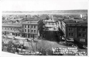 RPPC PIERRE, SD Capitol Ave Street Scene Adams Clothes Drug Store Postcard 1949