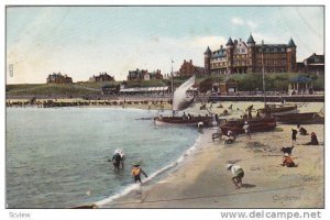 Sailboat and row boats on the beach, Gorleston, Great Yarmouth, Norfolk, Engl...