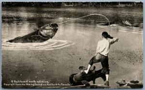 FISHING BULL-HEAD CATCHING CANADA VINTAGE EXAGGERATED REAL PHOTO POSTCARD RPPC