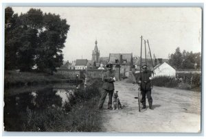 c1914-1918 WWI German Soldiers Village Dog Bicycle Germany RPPC Photo Postcard