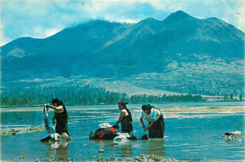 Ecuador Otavalo Indians women washing clothes in the San Pablo lake