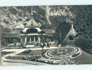 old rppc FLORAL CLOCK AND BUILDING Interlaken Switzerland HM1815