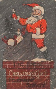 CHRISTMAS HOLIDAY SANTA CLAUS THE IDEAL GIFT TELEPHONE SERVICE POSTCARD (1910)