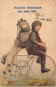 L400 New Year Greetings 1907 Chimney Sweep Dog riding bicycle postcard