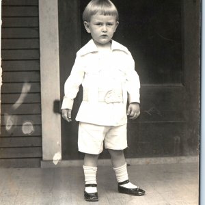 c1910s Serious Little Boy RPPC House Porch Real Photo White Fashion Bowlcut A160