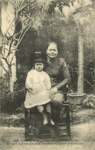 indochina, Cambodia, Woman holding her mixed-race European Child on her Lap